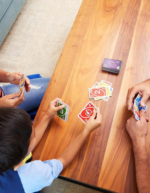 Load image into Gallery viewer, UNO FLIP! Family Card Game, with 112 Cards in a Sturdy Storage Tin, Makes a Great Toy for 7Y+ and up UNO FLIP! Family Card Game, with 112 Cards in a Sturdy Storage Tin (Amazon Exclusive)
